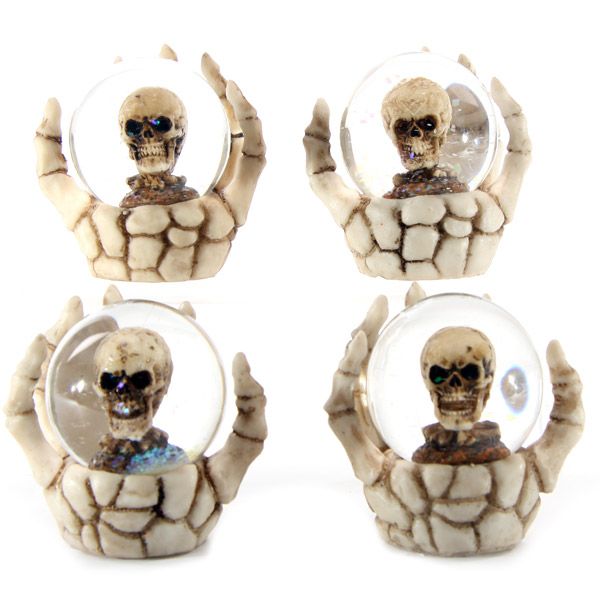Skull Snow Globe in Skeleton Hand Snow Globe