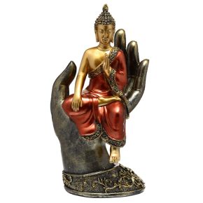 Gold & Red Thai Buddha Sitting in a Hand Gold & Red Thai Buddha Sitting in a Hand