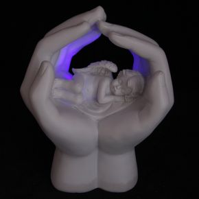 Sleeping Cherub in Hands with LED Sleeping Cherub in Hands with LED