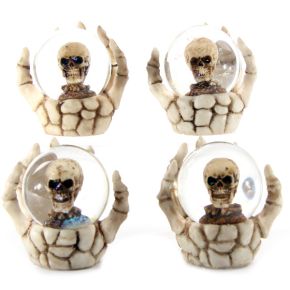 Skull Snow Globe in Skeleton Hand Snow Globe Skull Snow Globe in Skeleton Hand Snow Globe